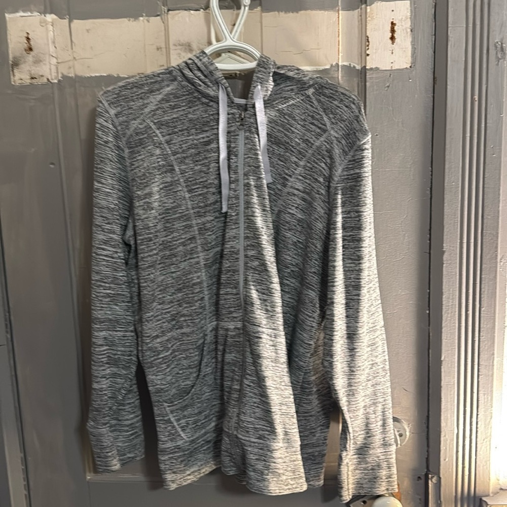 Women’s zip up jacket with a hood
